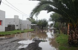 Santa Rita, una de cal y una de arena: Cordón cuneta y calles inundadas