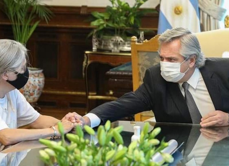 Patricia con el presidente.